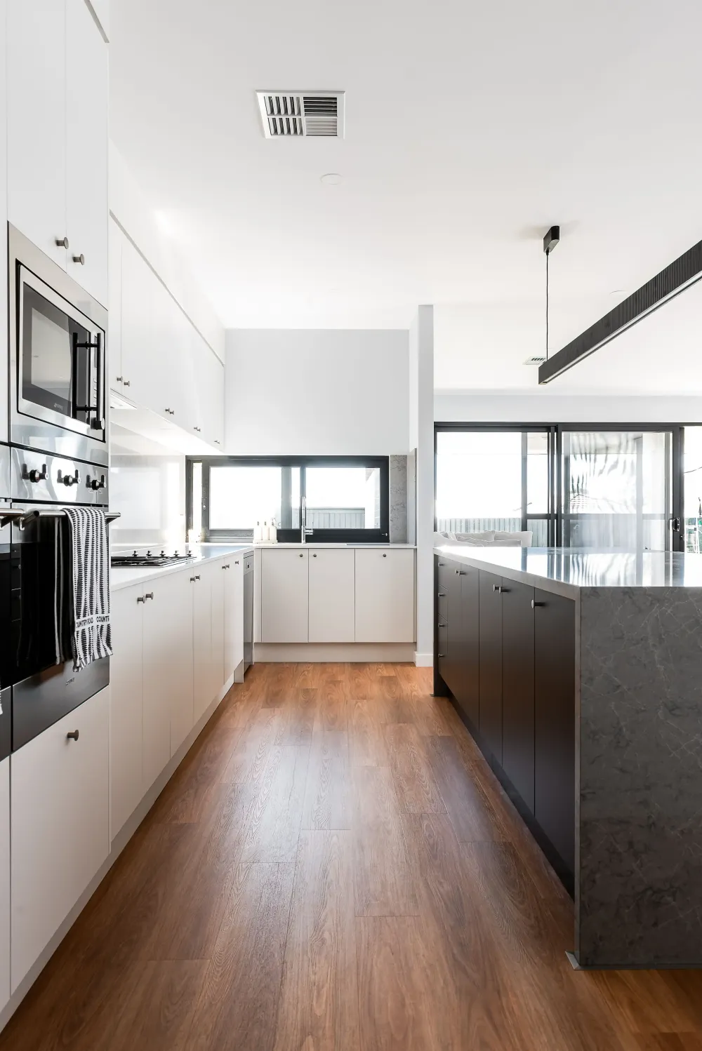 Bathroom vanity with arched mirror